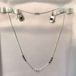 Silver necklace and earring set